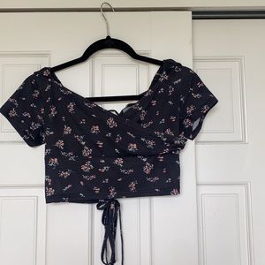 black and flowered crop top